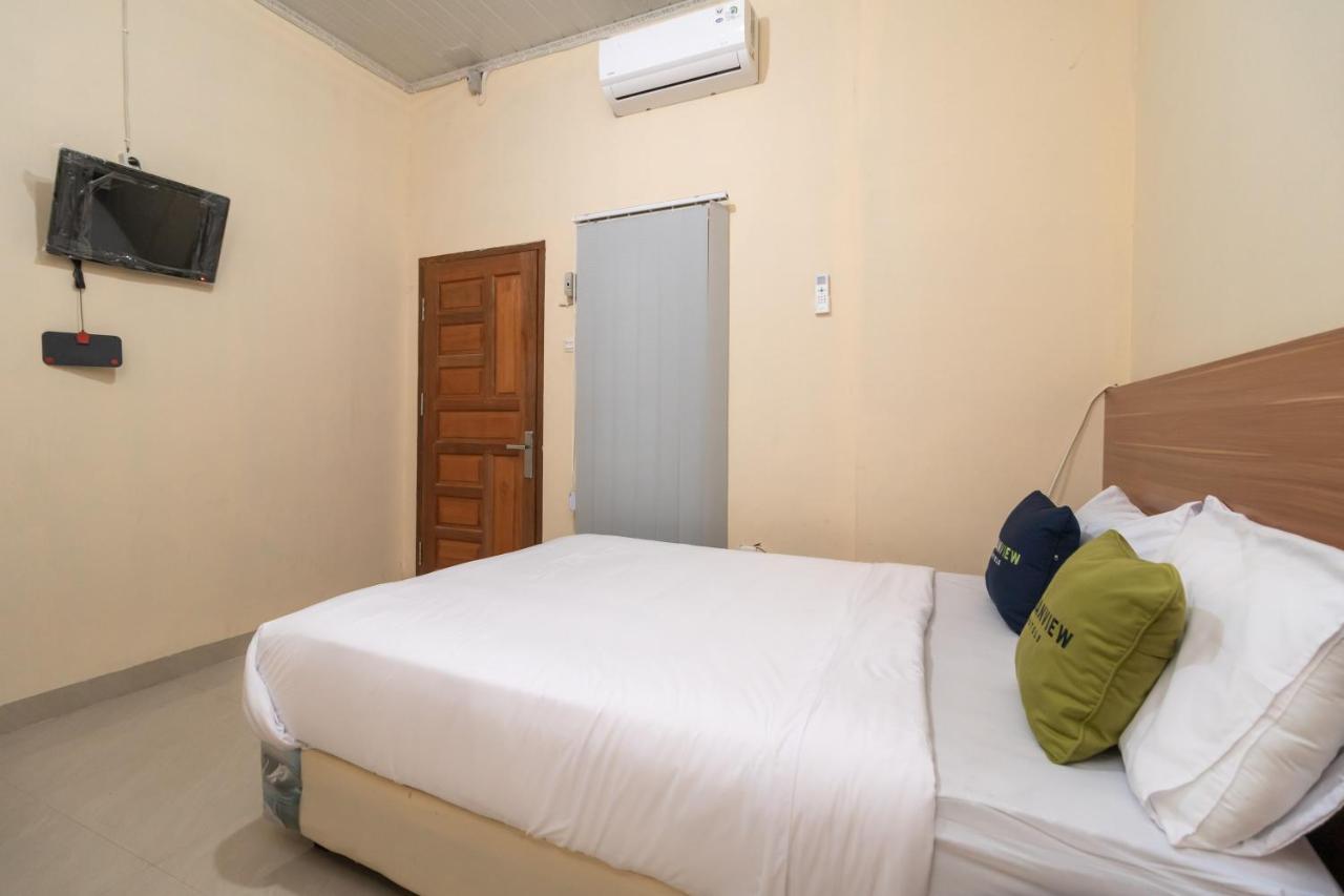 Urbanview Hotel Salsabilah Palembang Bagian luar foto